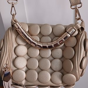 Metallic gold purse